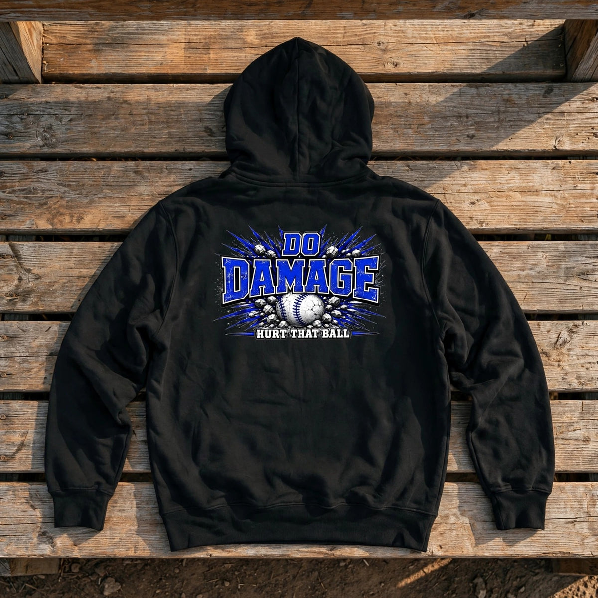 HTB Do Damage Hoodie in Black - back flat lay on a dugout bench