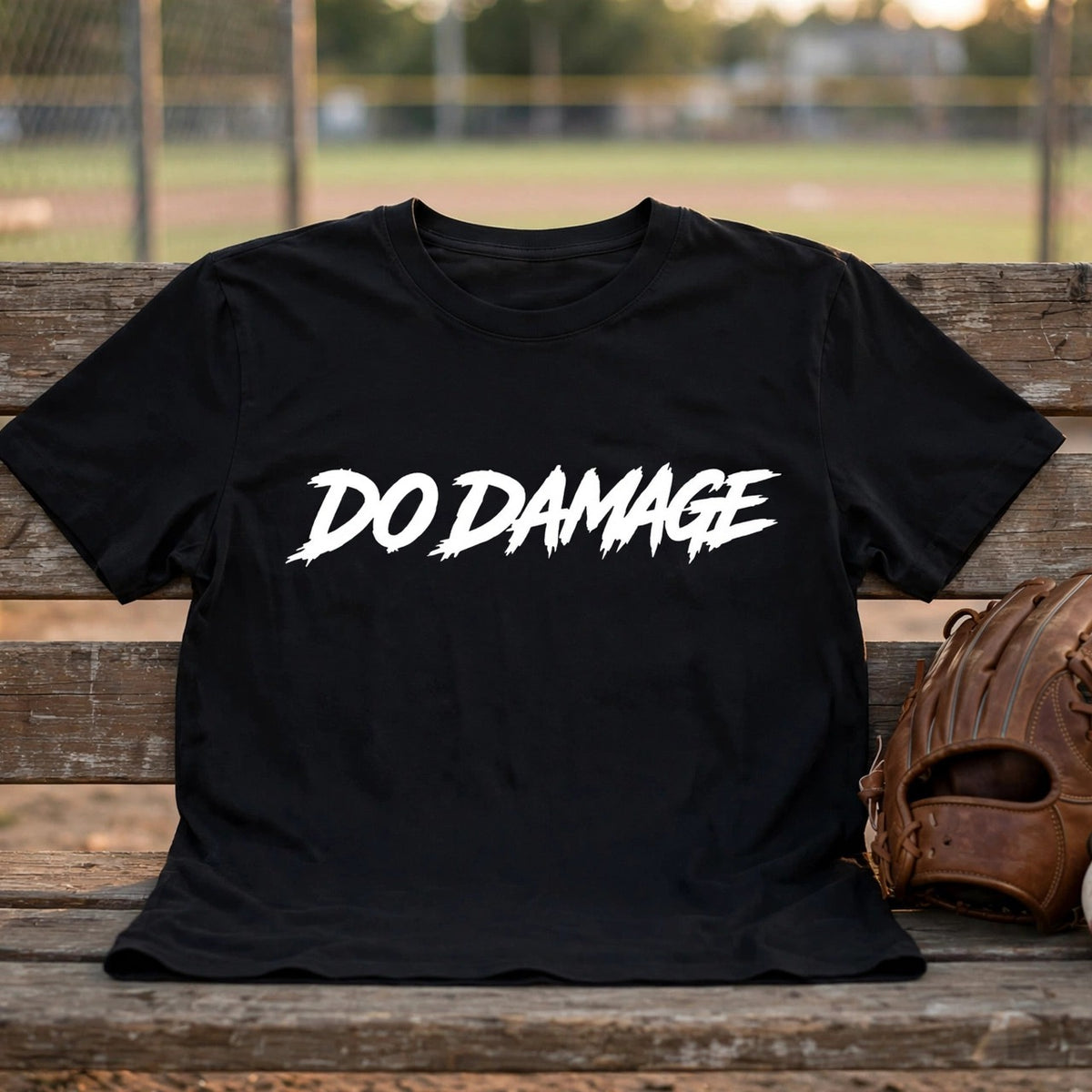 HTB Do Damage OG Tee - flat lay on a dugout bench